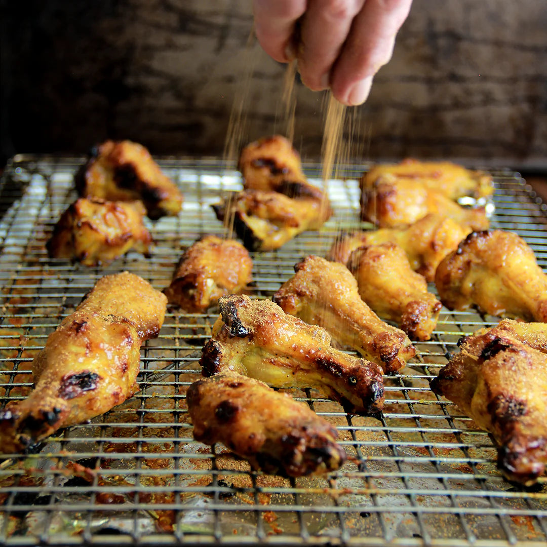 Photo of chicken wings on a rack