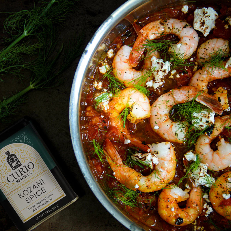 Photo of a pan of shrimp saganaki