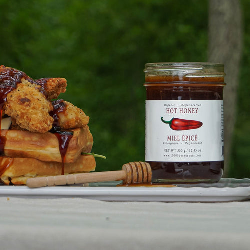 African Bronze Hot Honey poured over chicken and waffles.