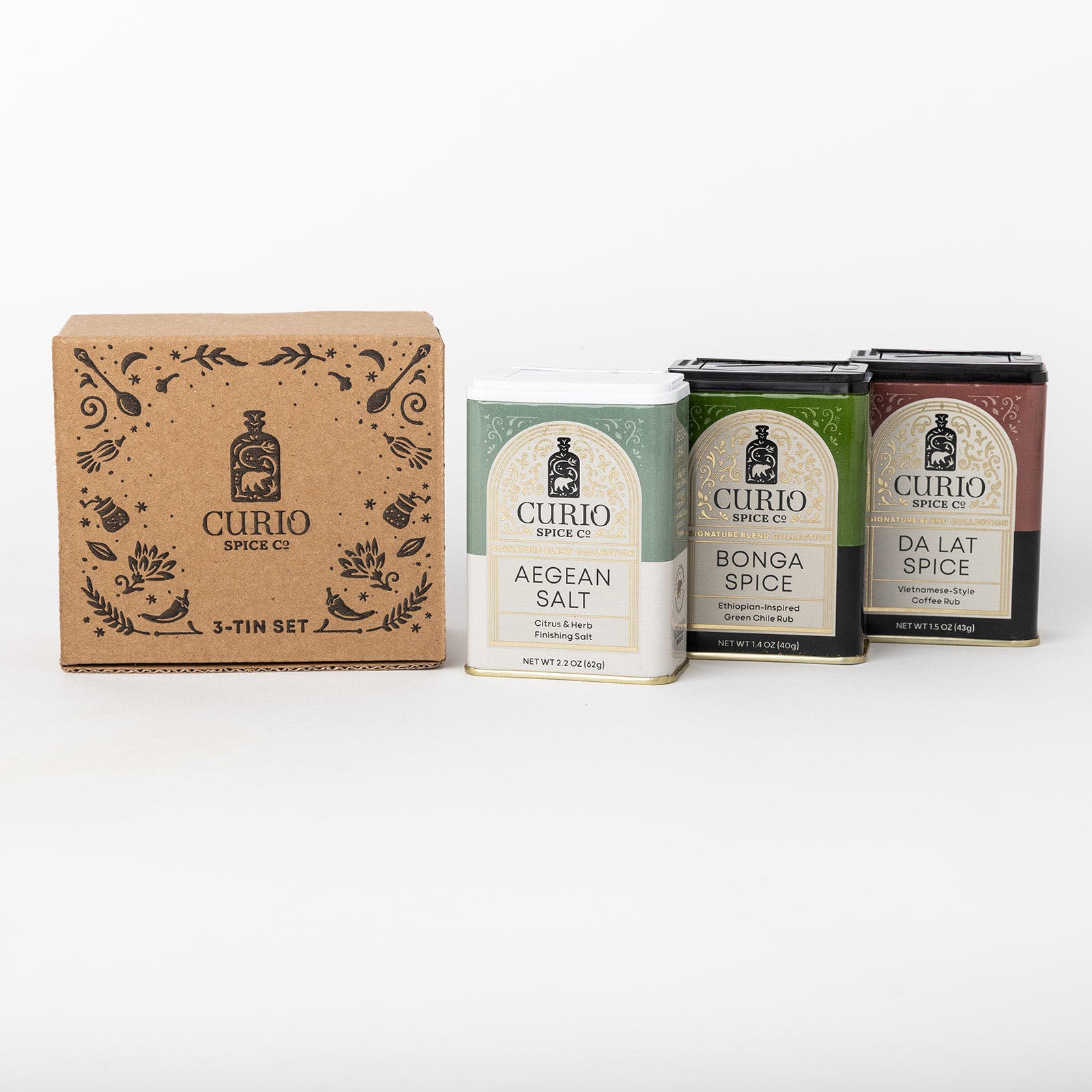 Curio Spice Co gift box with 3 spice tins on white background