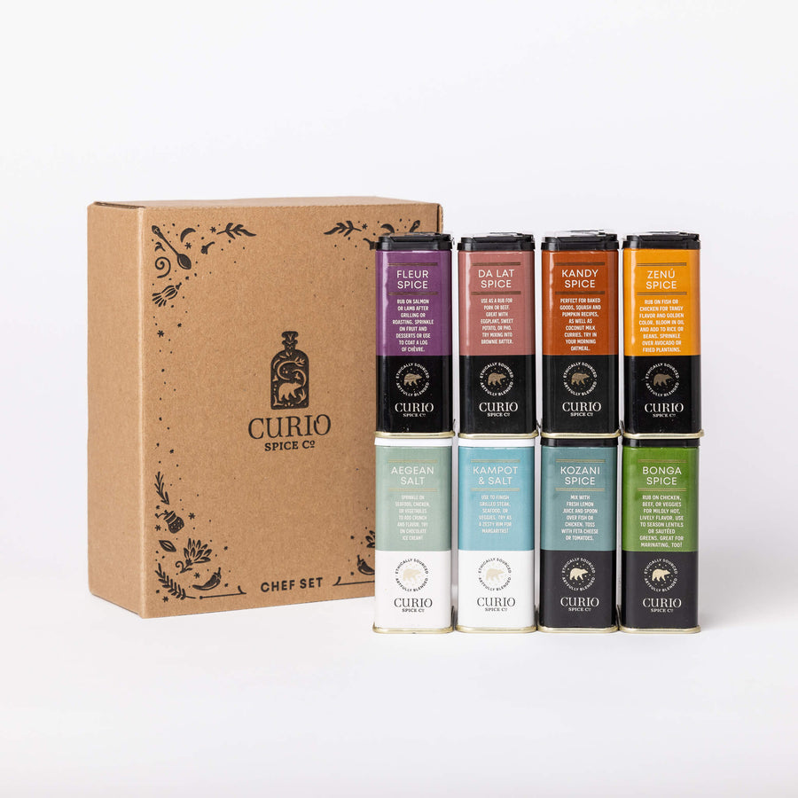 Curio Spice Co. spice set with a cardboard box on a white background