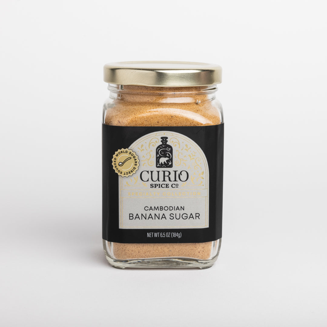 Jar of Cambodian Banana Sugar from Curio Spice Co. on a light gray background