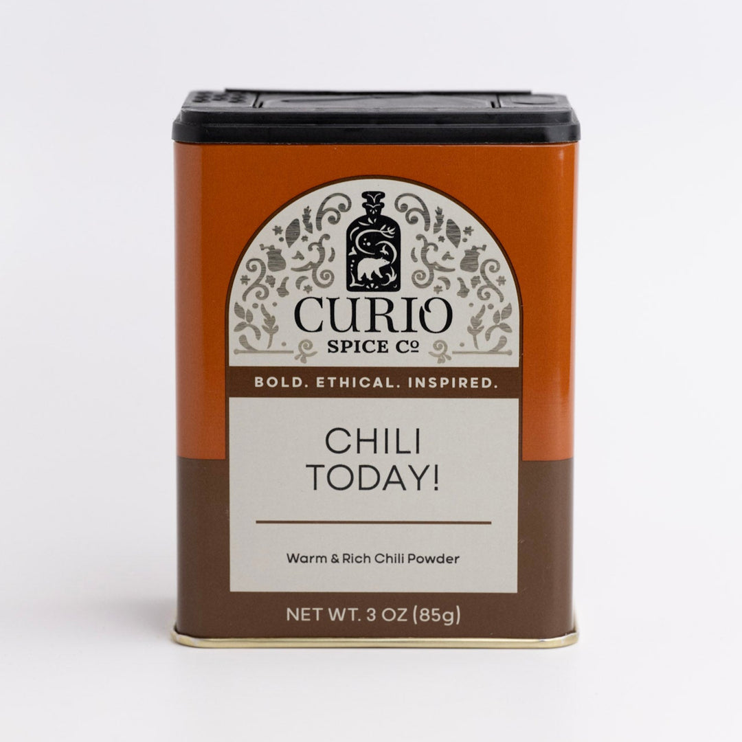 Curio Spice Co. chili powder canister on a white background