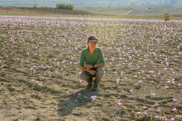 Claire Cheney in a saffron field in Greece