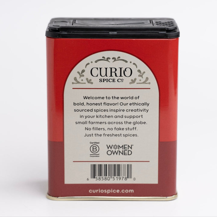 Curio Spice Co. spice tin with red label on a white background