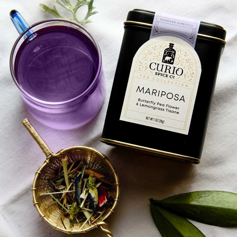 Photo of Mariposa tea with an image of brewed tea and a strainer of loose leaves