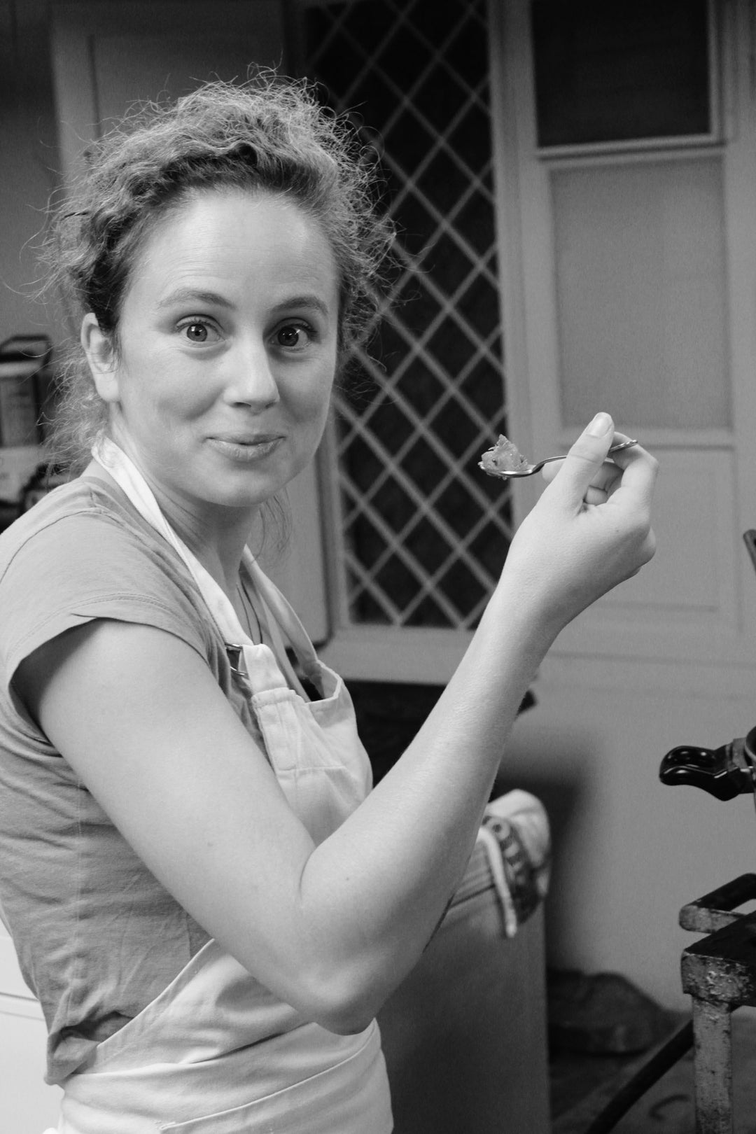 Photo of Claire Cheney holding a spoon
