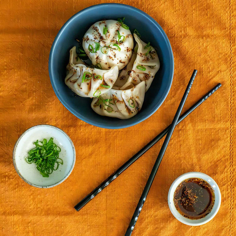 Betty Liu's Chile Crisp Dust as an oil drizzled on dumplings and bao buns.
