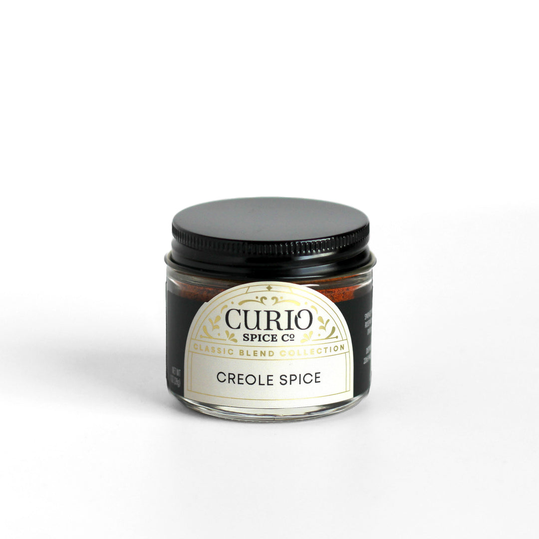 Curio Spice Co. Classic Blend Creole Spice in a glass jar.
