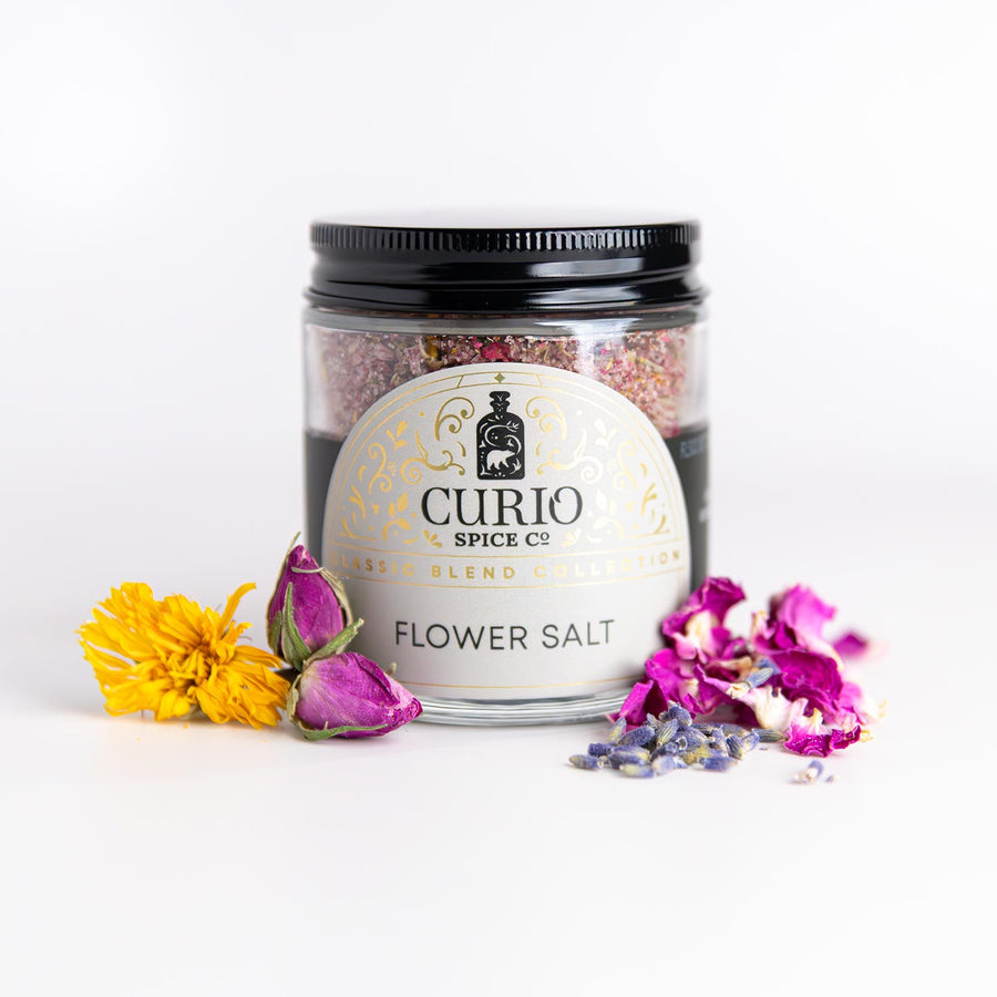Glass jar of Flower Salt, a delight for the senses, this limited-edition blend is both bold and delicate, sweet and salty, exquisite and accessible.