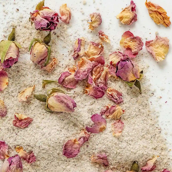 Scattered rose buds and petals with sugar