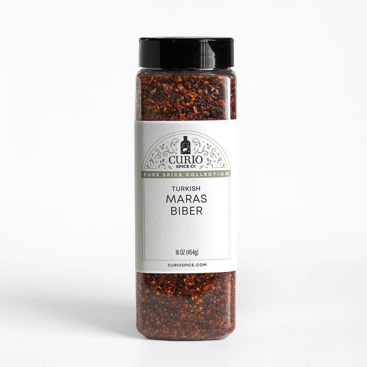 Curio Spice Co. fair-trade single origin sustainable Turkish Maras Biber chile flakes in a bulk jar.