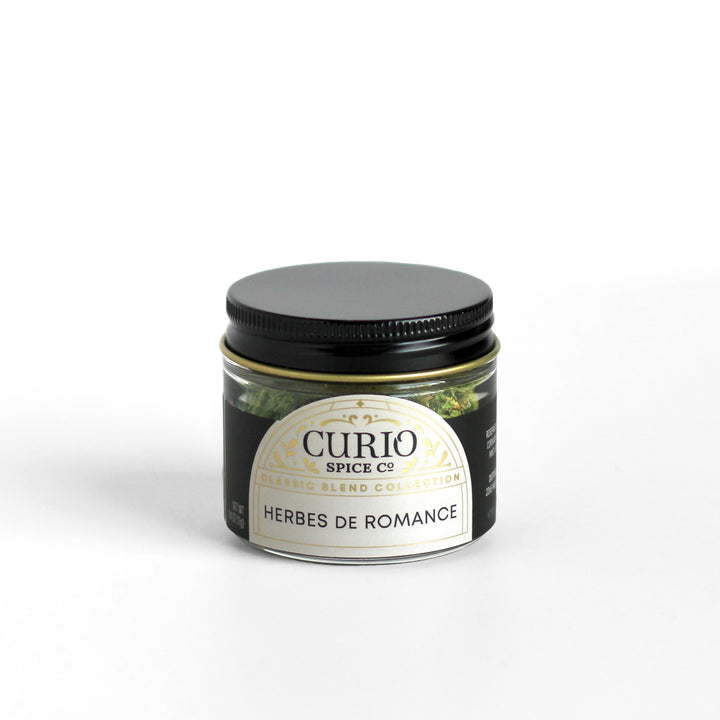Curio Spice Co. Classic Blend Herbes de Romance in a glass jar.