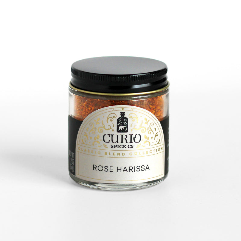 A glass jar of Rose Harissa, a widely used and beloved blend throughout the Middle East.