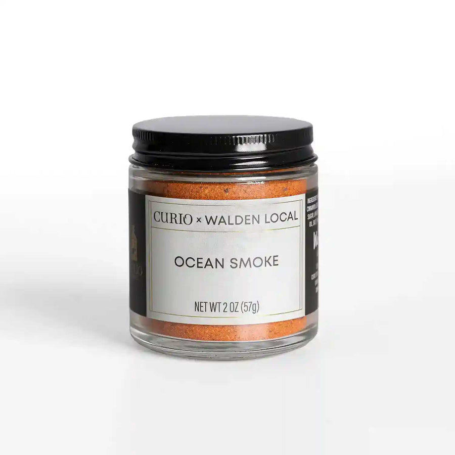 A glass jar of Ocean Smoke, a collaboration spice blend with Walden Local and Curio Spice