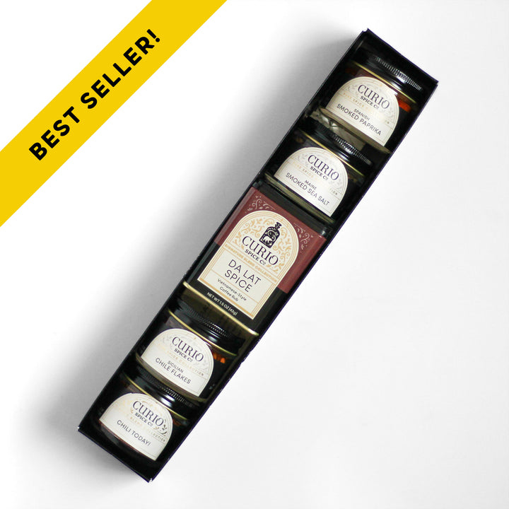 Curio Spice Co. Smoke And Grill gift set featuring the Da Lat Spice Signature Blend, Chili Today! Classic Blend, and and fair-trade single origin sustainable spices.