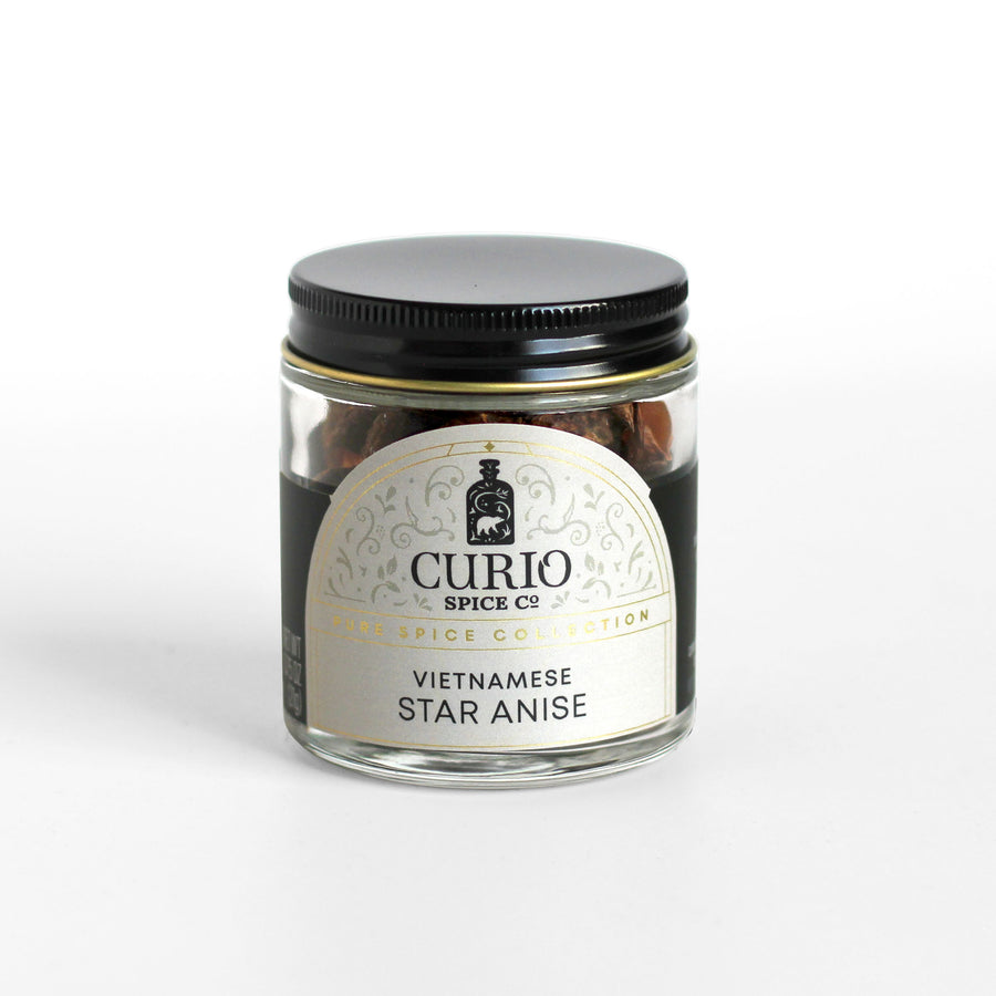 Glass jar of Vietnamese Star Anise with the Curio Spice Co. logo.