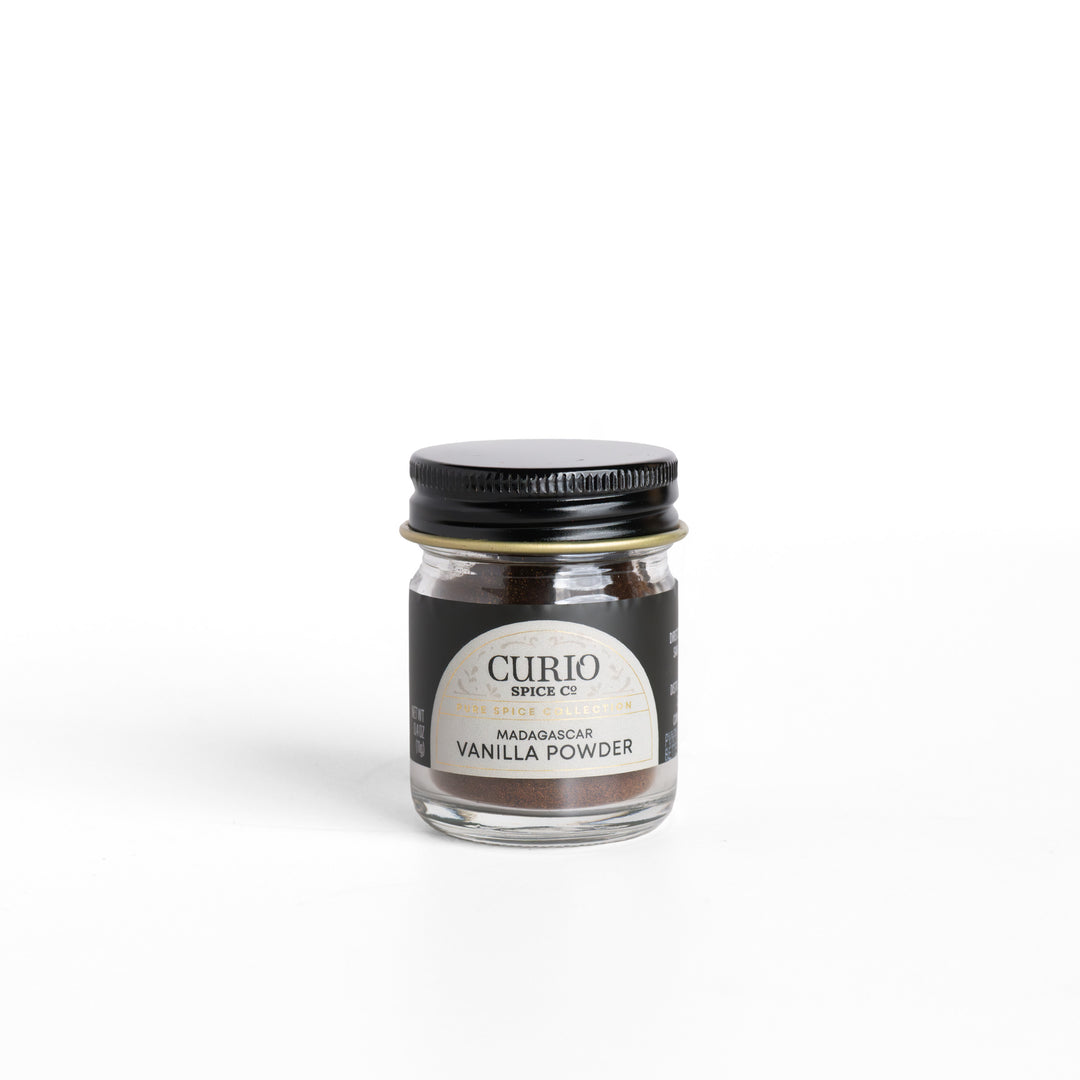 Curio Spice Co. pure Madagascar Vanilla Powder in a glass jar.