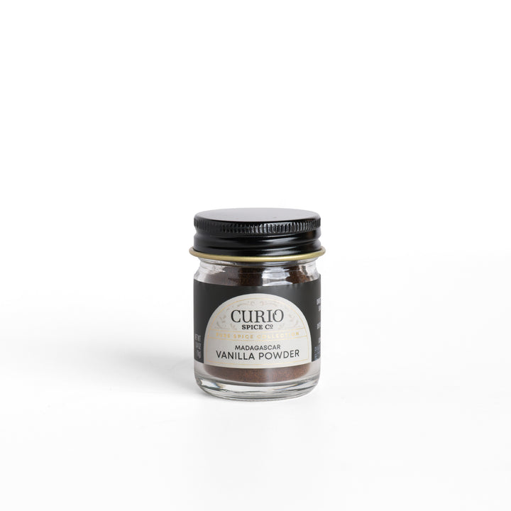 Curio Spice Co. pure Madagascar Vanilla Powder in a glass jar.