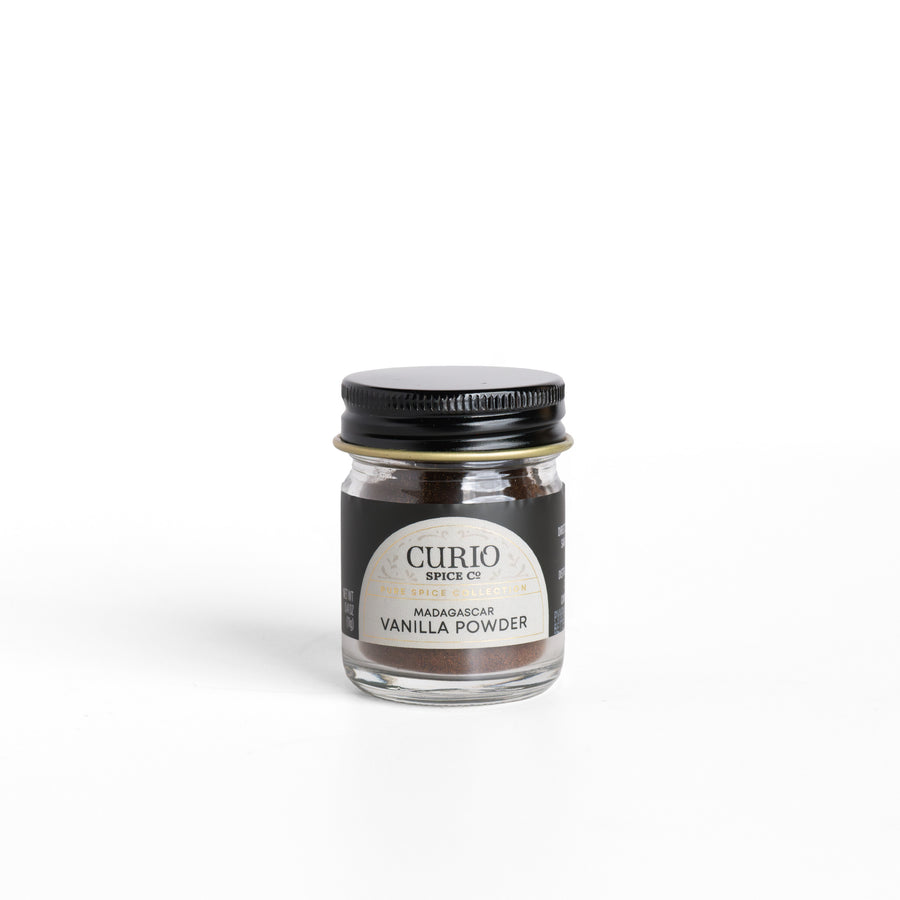 Curio Spice Co. pure Madagascar Vanilla Powder in a glass jar.