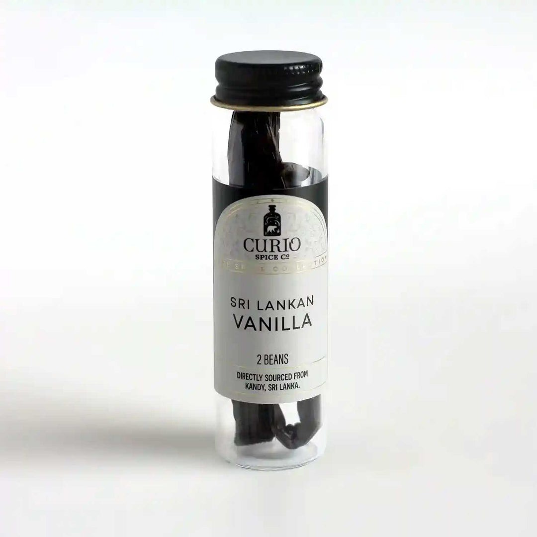 Slim glass jar of Sri Lankan Vanilla beans.