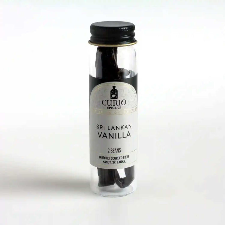 Slim glass jar of Sri Lankan Vanilla beans.