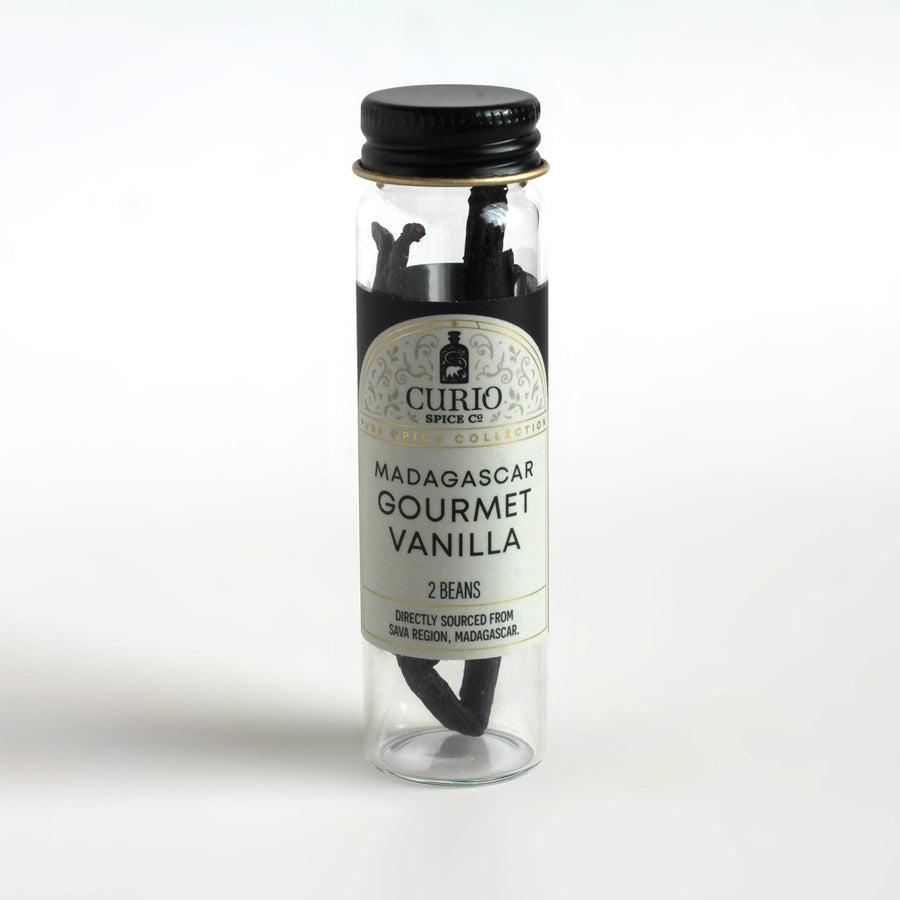 Curio Spice Co. Madagascar Gourmet Vanilla Bean Pods in a glass jar.