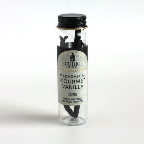 Curio Spice Co. Madagascar Gourmet Vanilla Bean Pods in a glass jar.