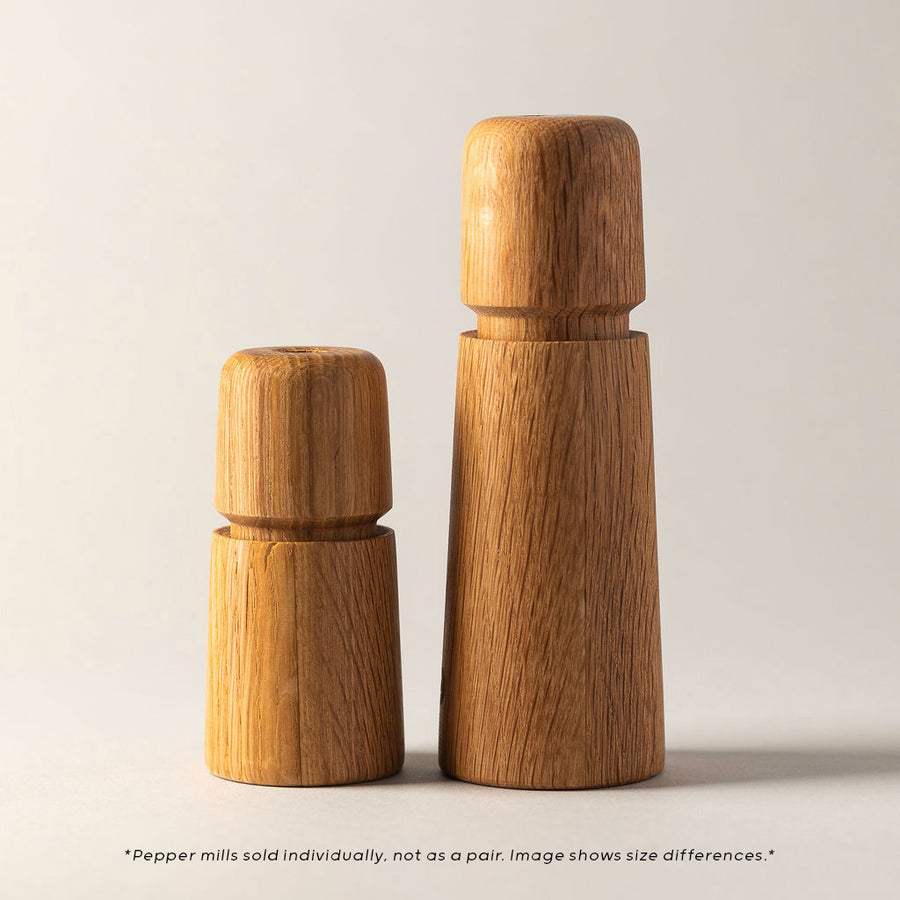 4" and 7" Stockholm Pepper Mills in an oak finish.