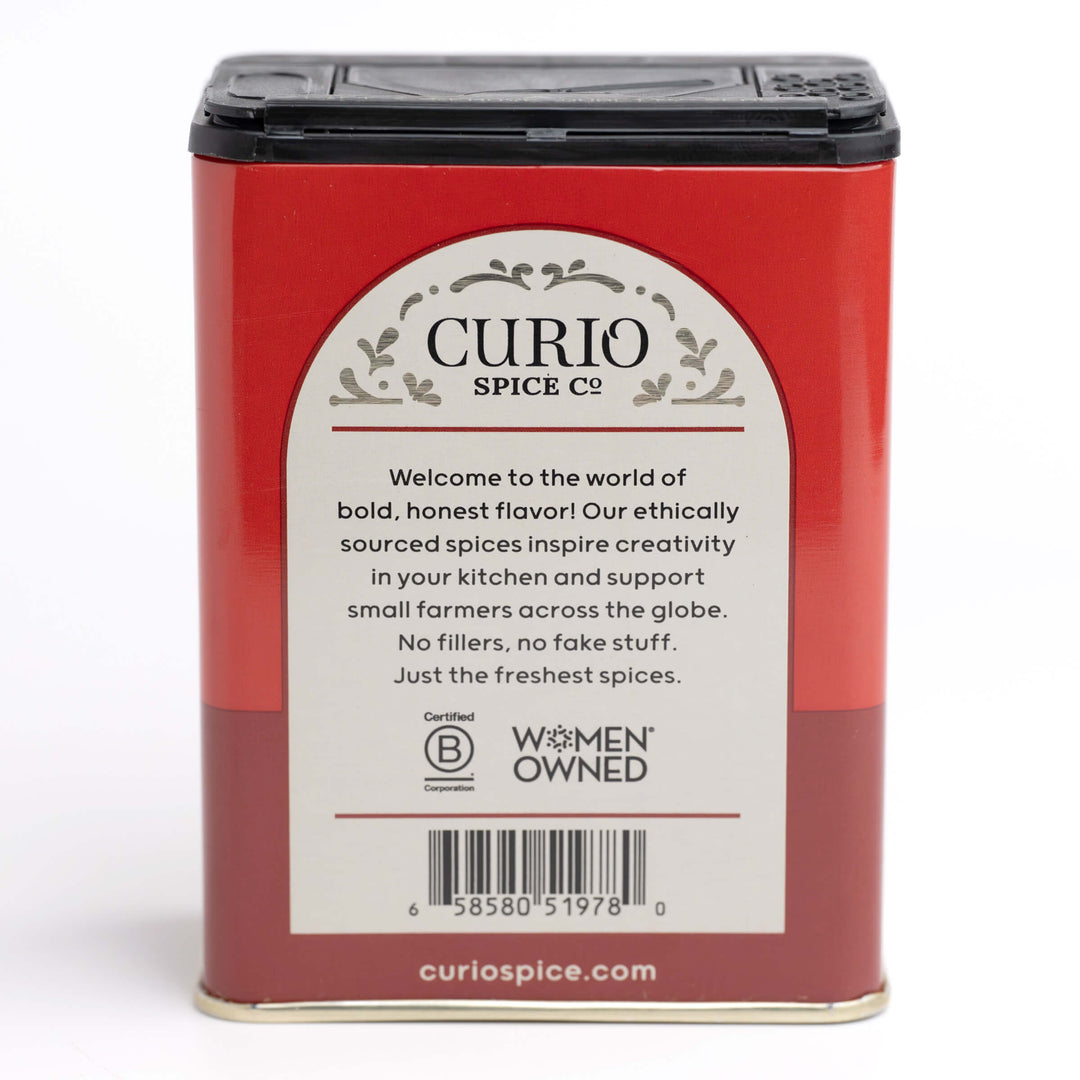 Curio Spice Co. spice tin with red label on a white background