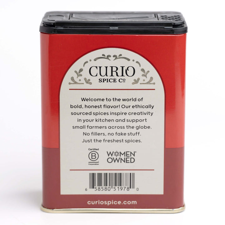 Curio Spice Co. spice tin with red label on a white background