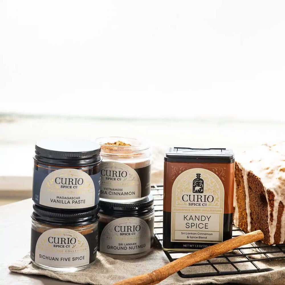 Jars and tins within Baker's Joy next to a glazed bread