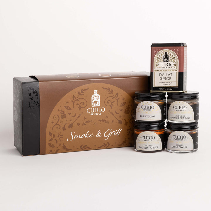 Curio Spice Co. Smoke And Grill gift set featuring the Da Lat Spice Signature Blend, Chili Today! Classic Blend, and and fair-trade single origin sustainable spices.