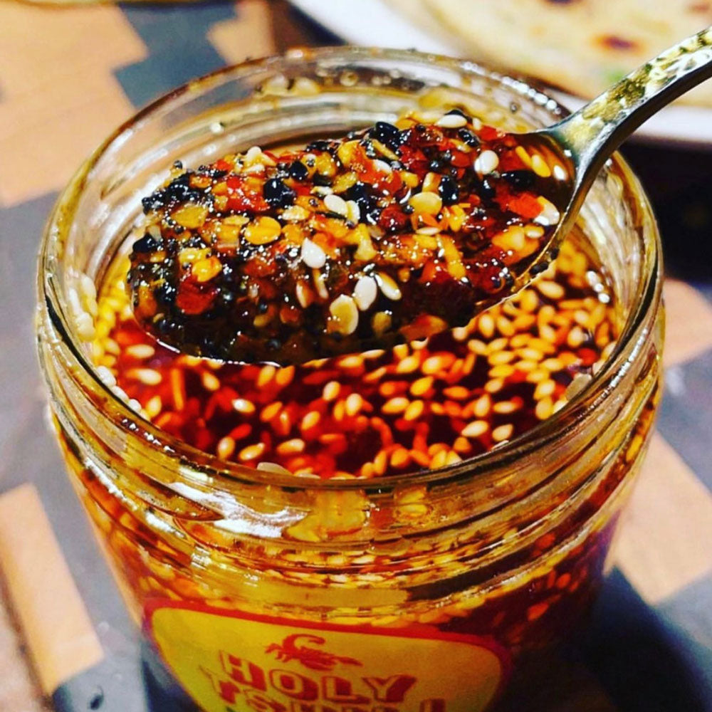 Holy Tshili chili crisp on a spoon