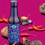 Black Garlic N Peri Peri Hot Sauce with chilies and black garlic
