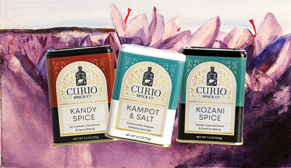 Three Curio Spice tins on a watercolor background