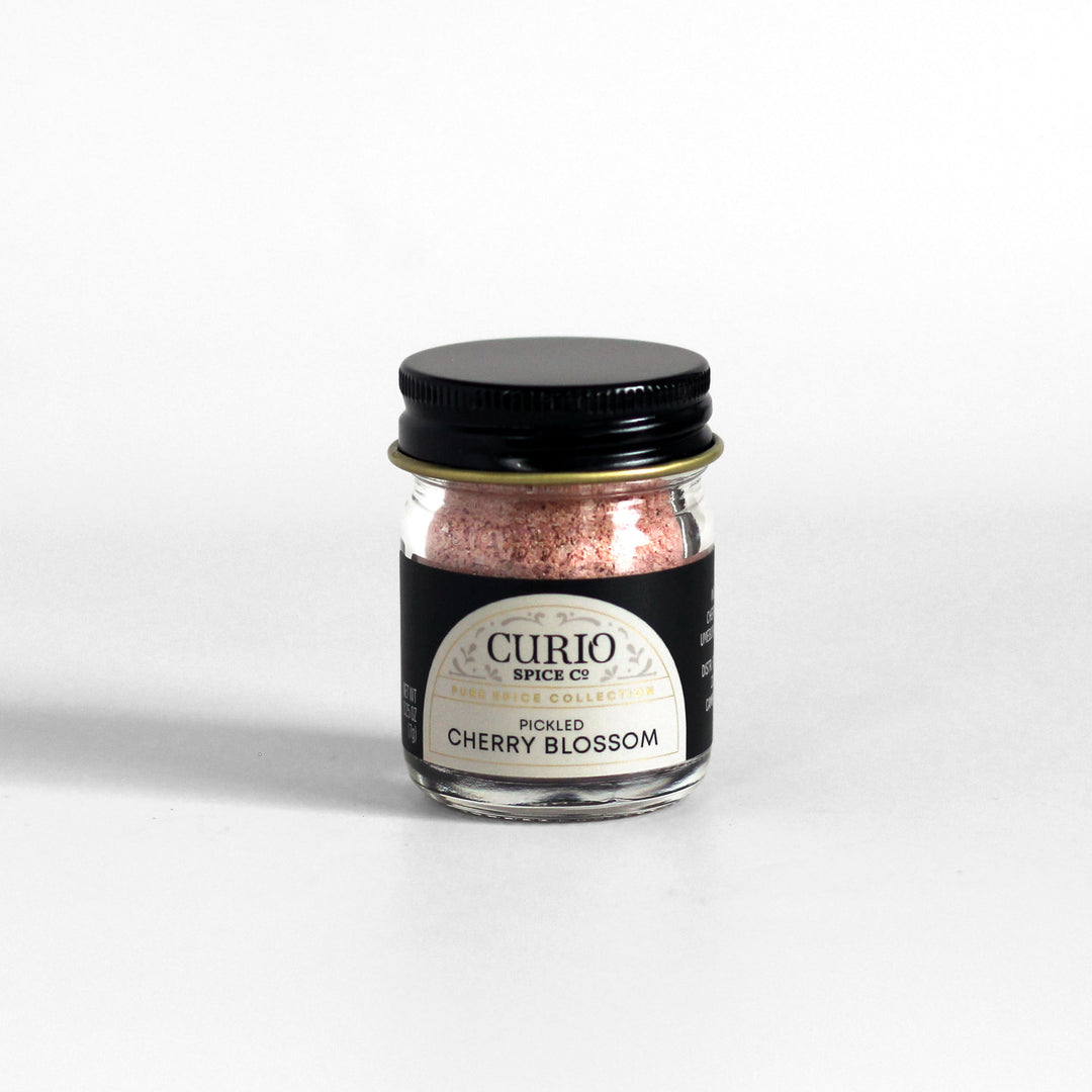 Curio Spice Co. fair-trade single origin sustainable Pickled Cherry Blossom in a glass jar.
