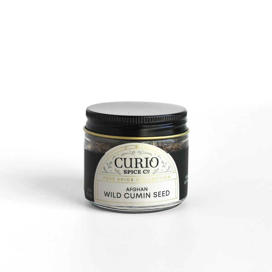 Curio Spice Co. fair-trade single origin sustainable Afghan wild cumin seed in a glass jar.