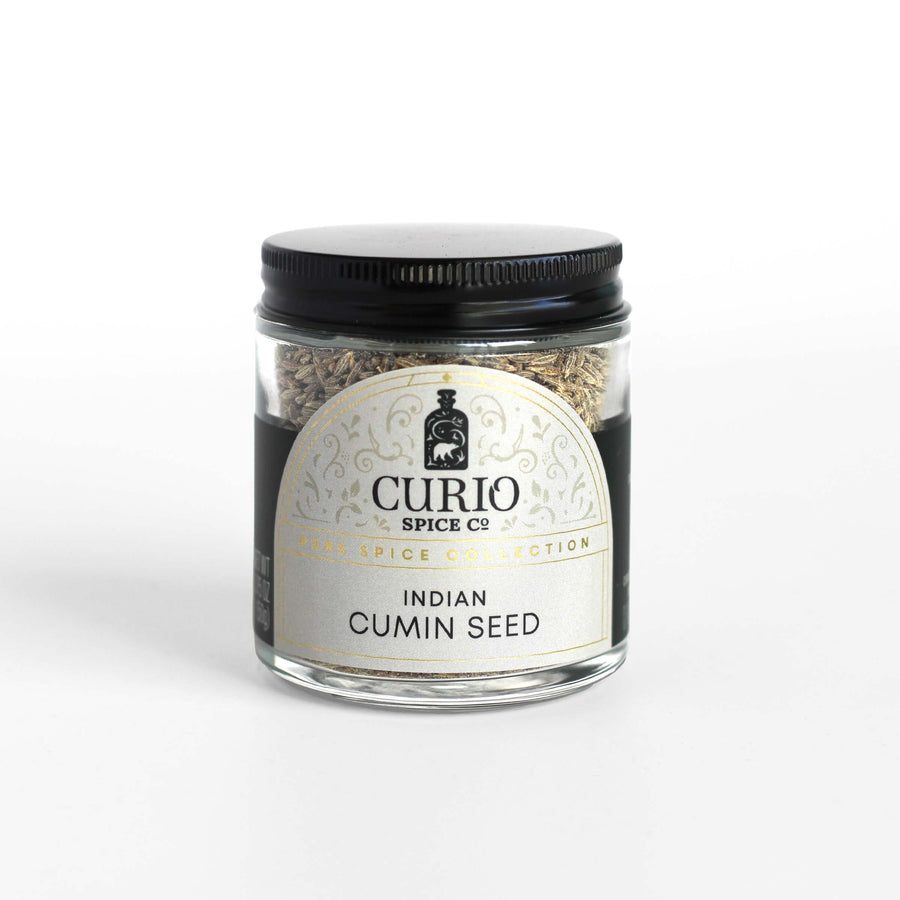 Curio Spice Co. fair-trade single origin sustainable Indian cumin seed in a glass jar.