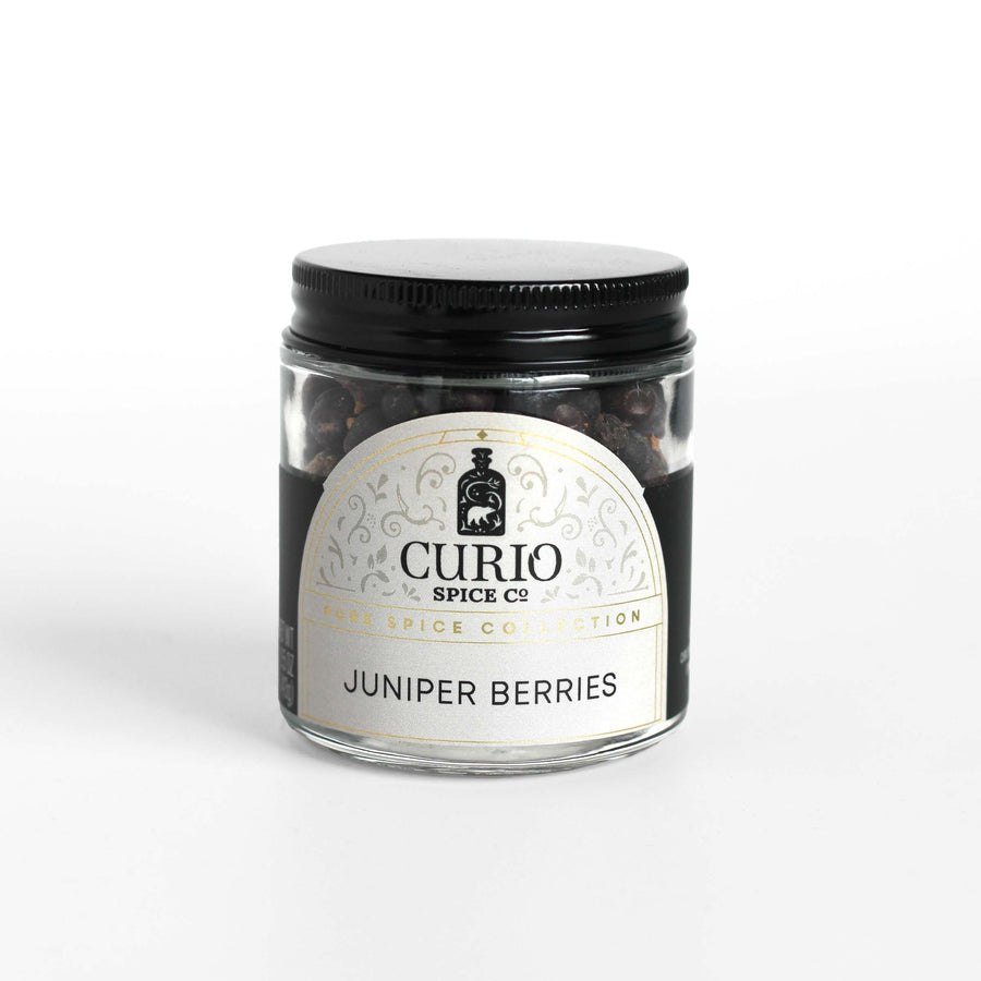 Curio Spice Co. fair-trade single origin sustainable juniper berries in a glass jar.