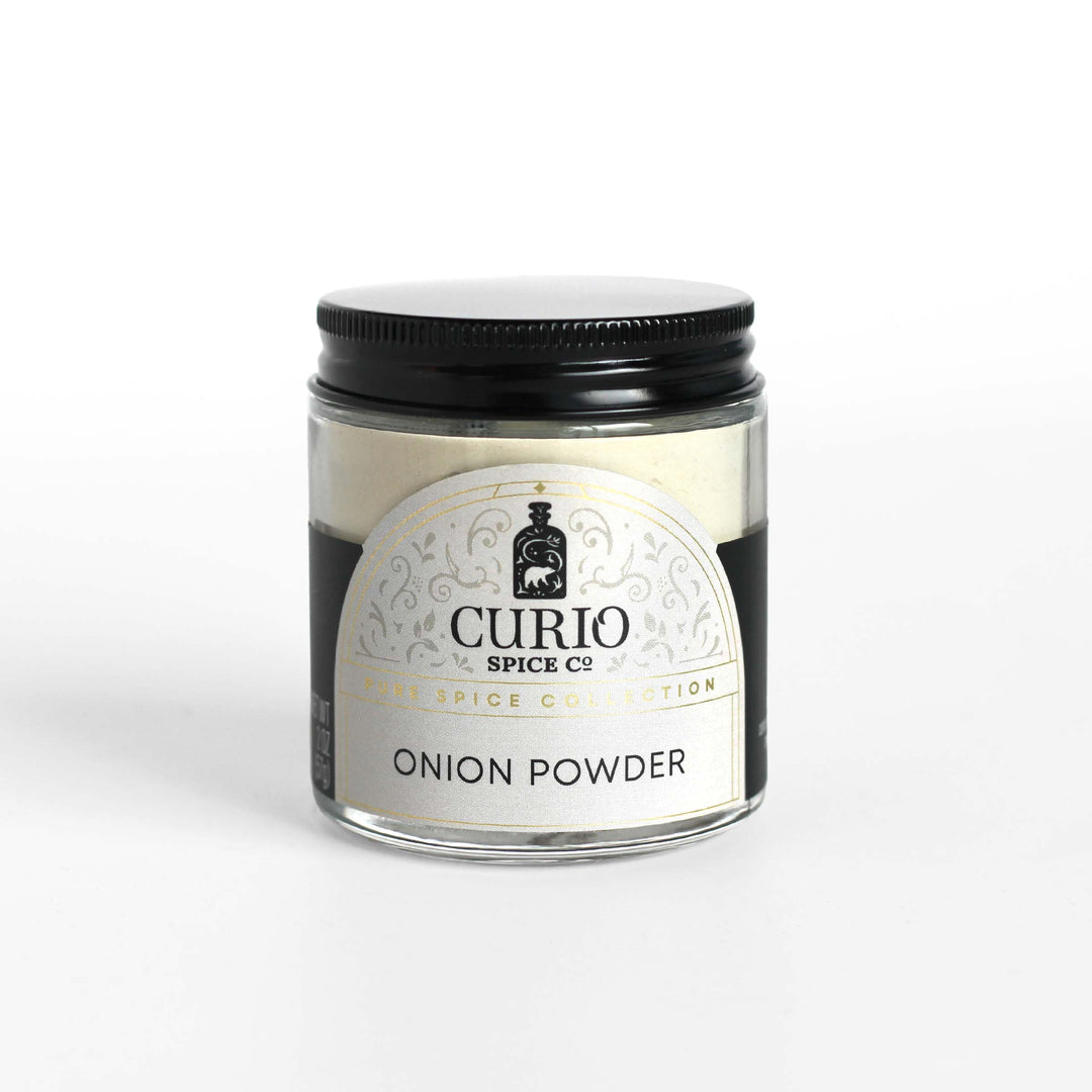 Curio Spice Co. fair-trade single origin sustainable onion powder in a glass jar.