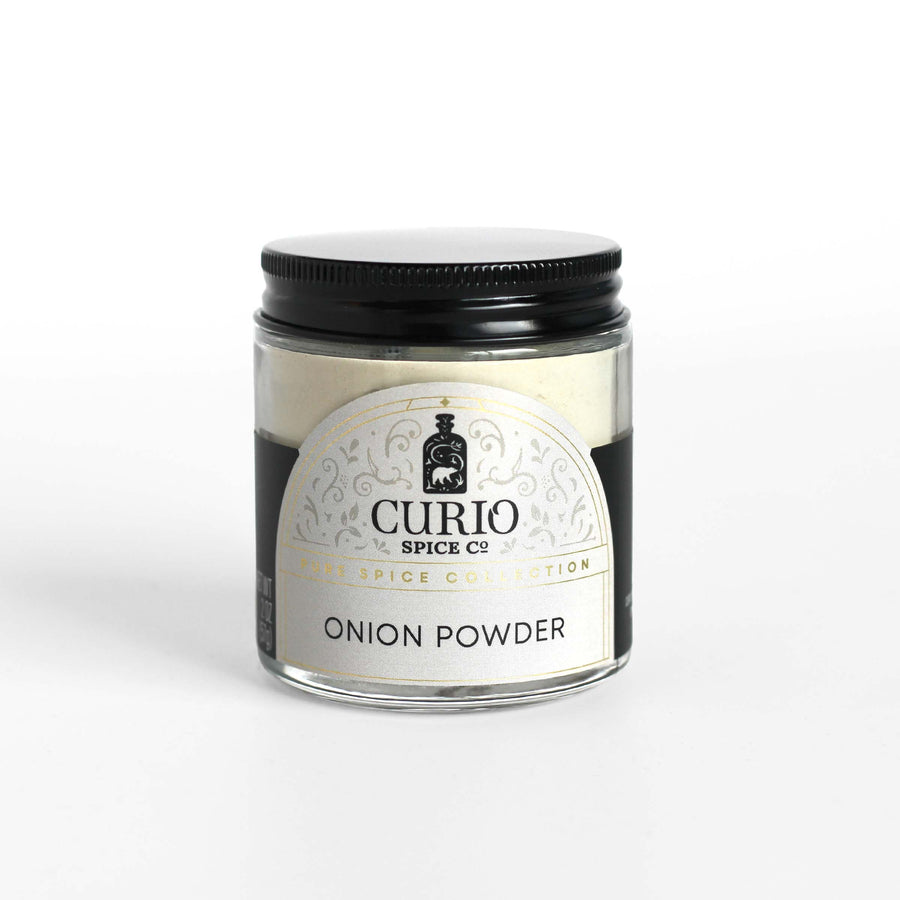 Curio Spice Co. fair-trade single origin sustainable onion powder in a glass jar.