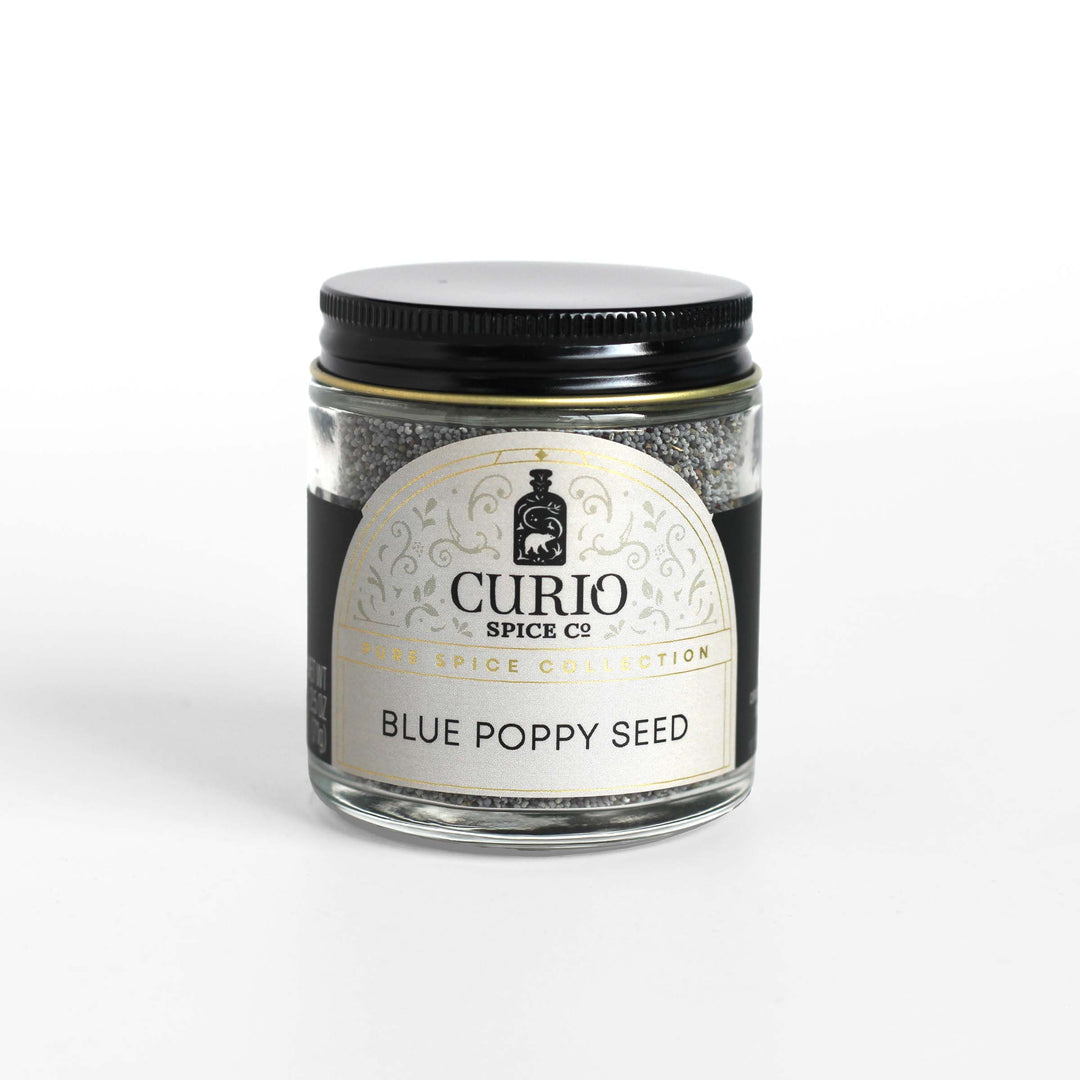 Curio Spice Co. fair-trade single origin sustainable blue poppy seed in a glass jar.