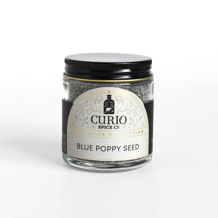 Curio Spice Co. fair-trade single origin sustainable blue poppy seed in a glass jar.