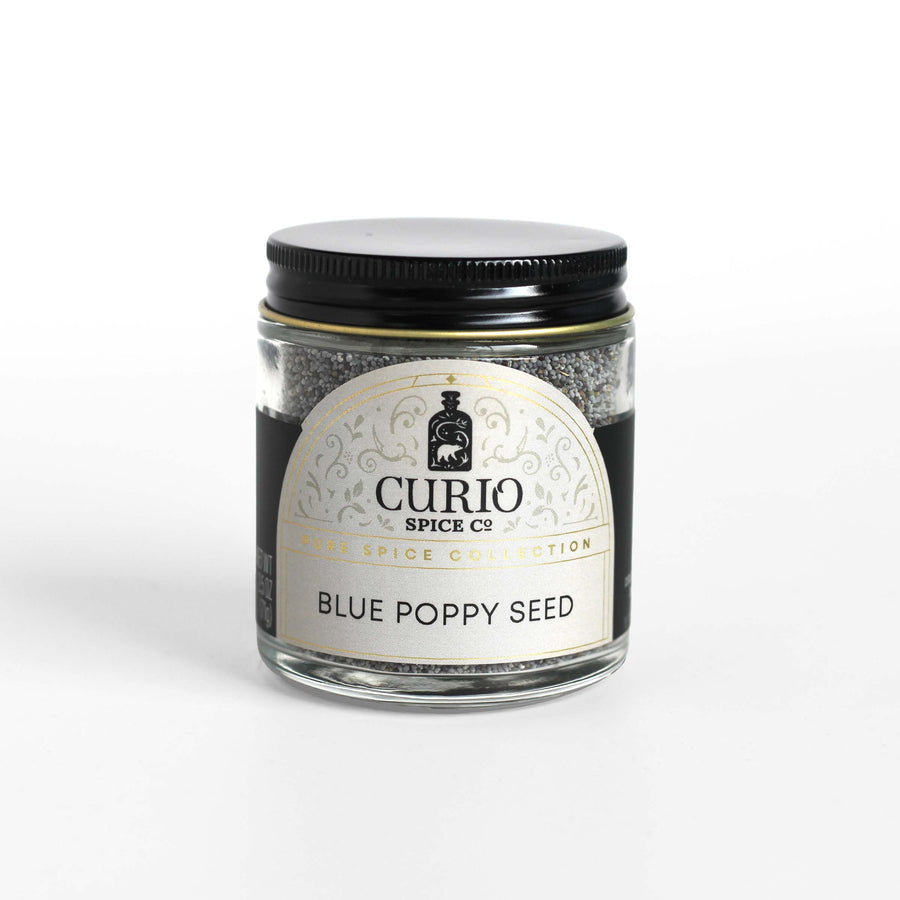 Curio Spice Co. fair-trade single origin sustainable blue poppy seed in a glass jar.