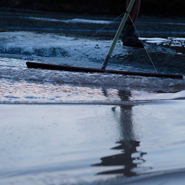 Sea salt harvesting in the marsh fields of Brittany, France.