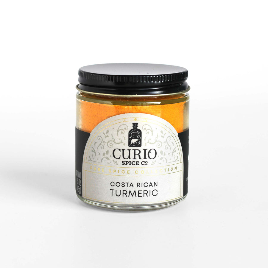 Curio Spice Co. fair-trade single origin sustainable Costa Rican Turmeric in a glass jar.