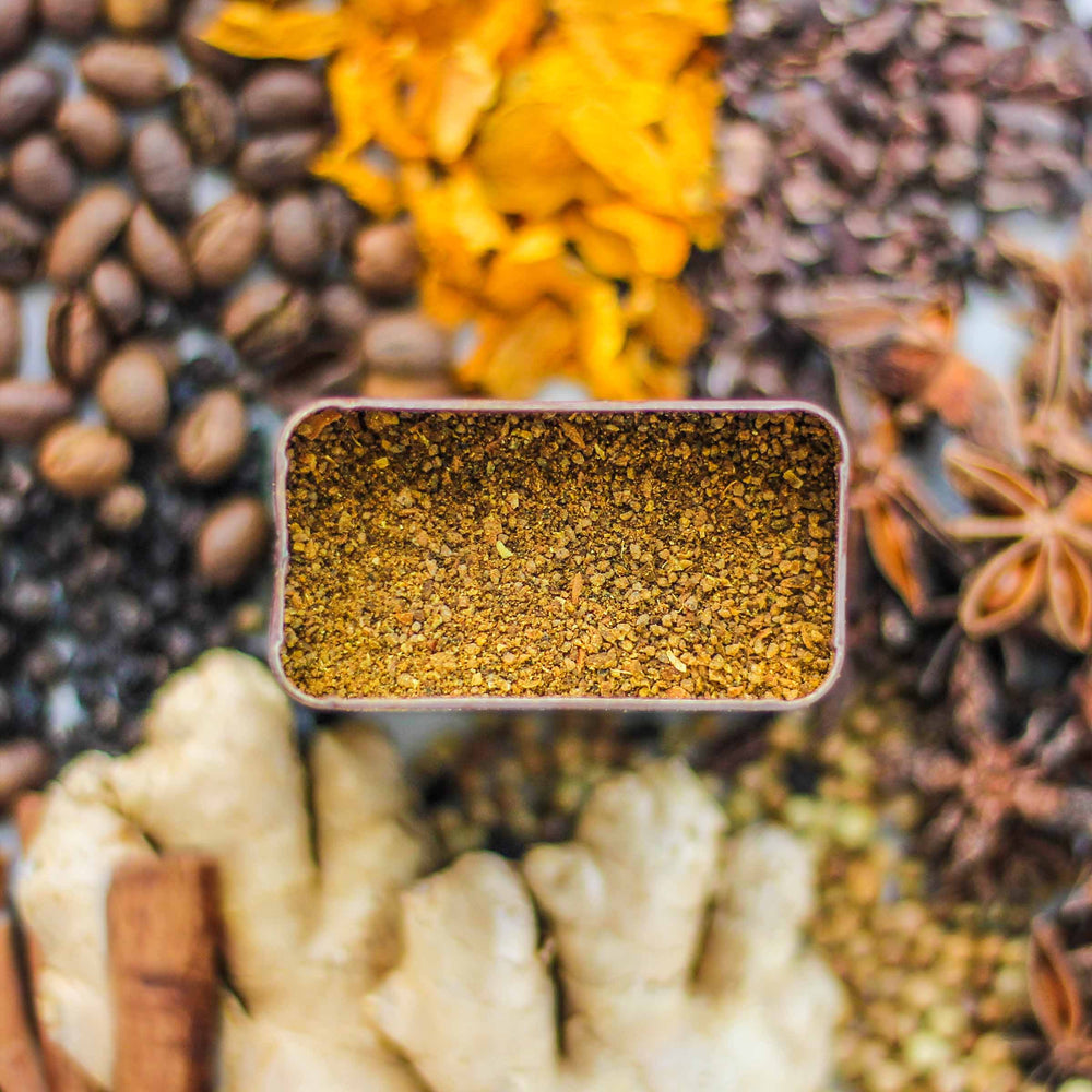 Top-down view of Da Lat Spice with cocoa nibs, coffee, black pepper, and more.