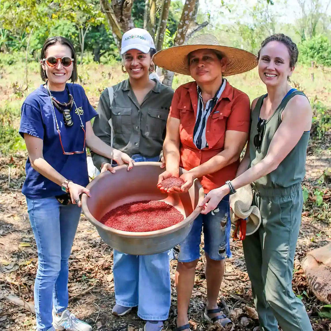 Group photo of Claire, the Founder and Blender-In-Chief of Curio Spice, with harvesters in Colombia.