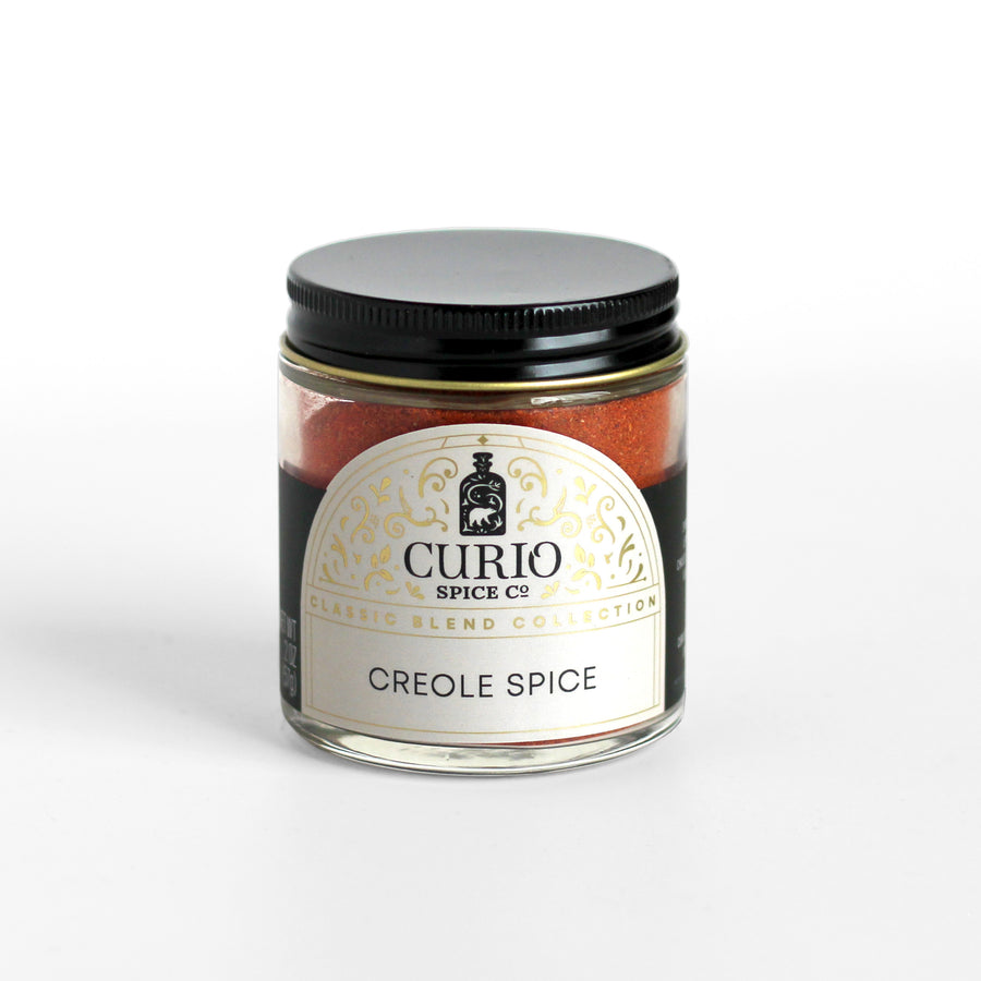 Curio Spice Co. Classic Blend Creole Spice in a glass jar.